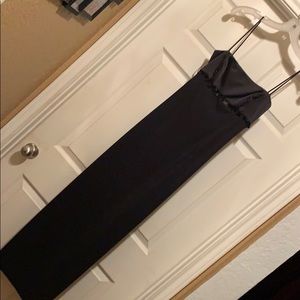 Black spaghetti strap prom dress.